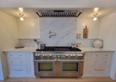 Inset shaker kitchen with traditional oak island